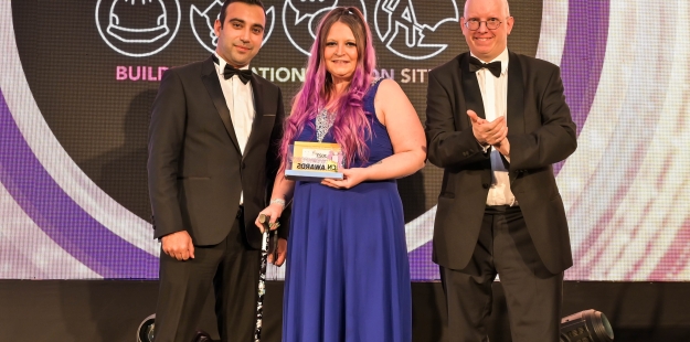 Vikky collecting her award on stage