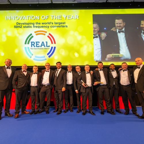 REAL Alliance collecting an award