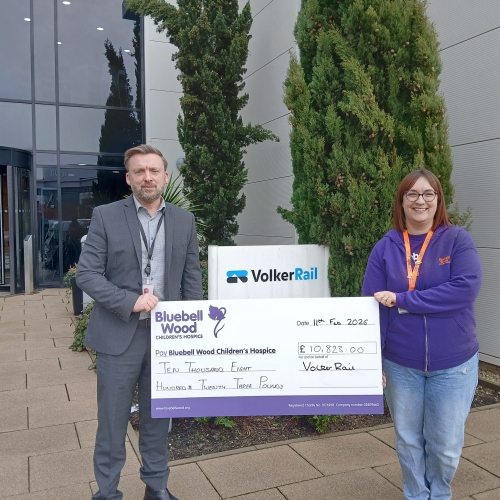 Cheque handover to Bluebell wood outside of VolkerRail's office