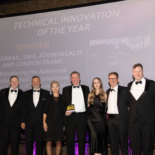 Group of people collecting the light rail award