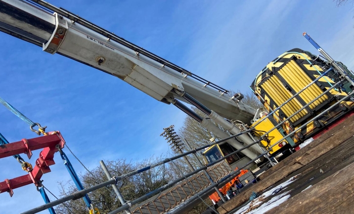 A Kirow crane installing a bridge