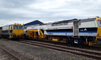 A Matisa tamper tamping on the railway tracks