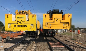 Two Kirow 1200 cranes working on the railway