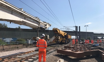 Two Kirow 1200 cranes working on the railway