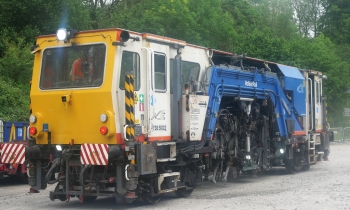 A Beaver tamper on track