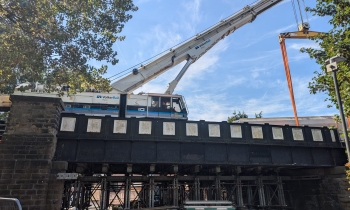A Kirow 1200 lifting a derailed wagon