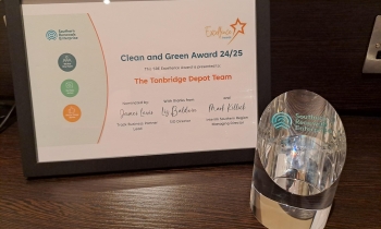 Picture of the trophy and certificate