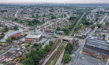 aerial of a crane doing bridge demolition work