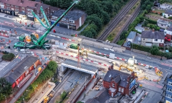 aerial of a crane doing bridge demolition work