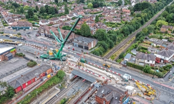 aerial of a crane doing bridge demolition work