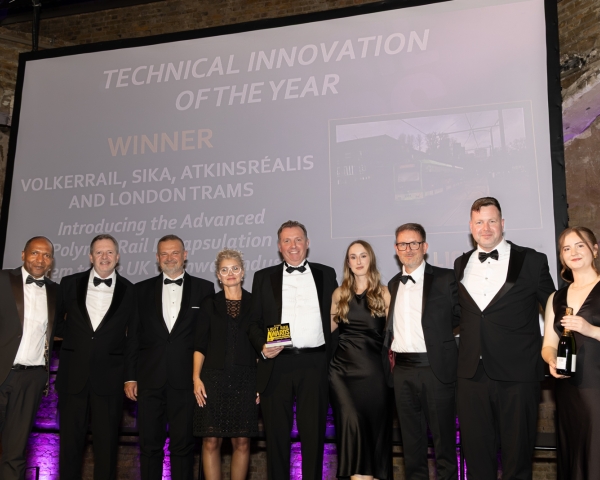 Group of people collecting the light rail award