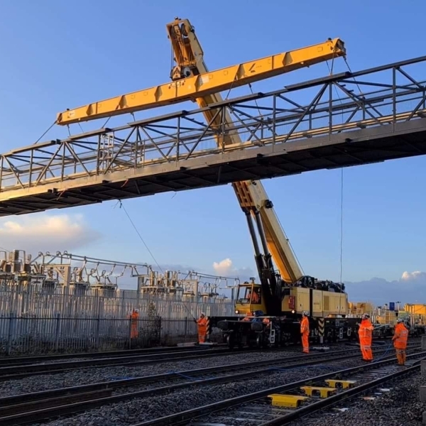 Kirow 1200 crane installing overhead line structure