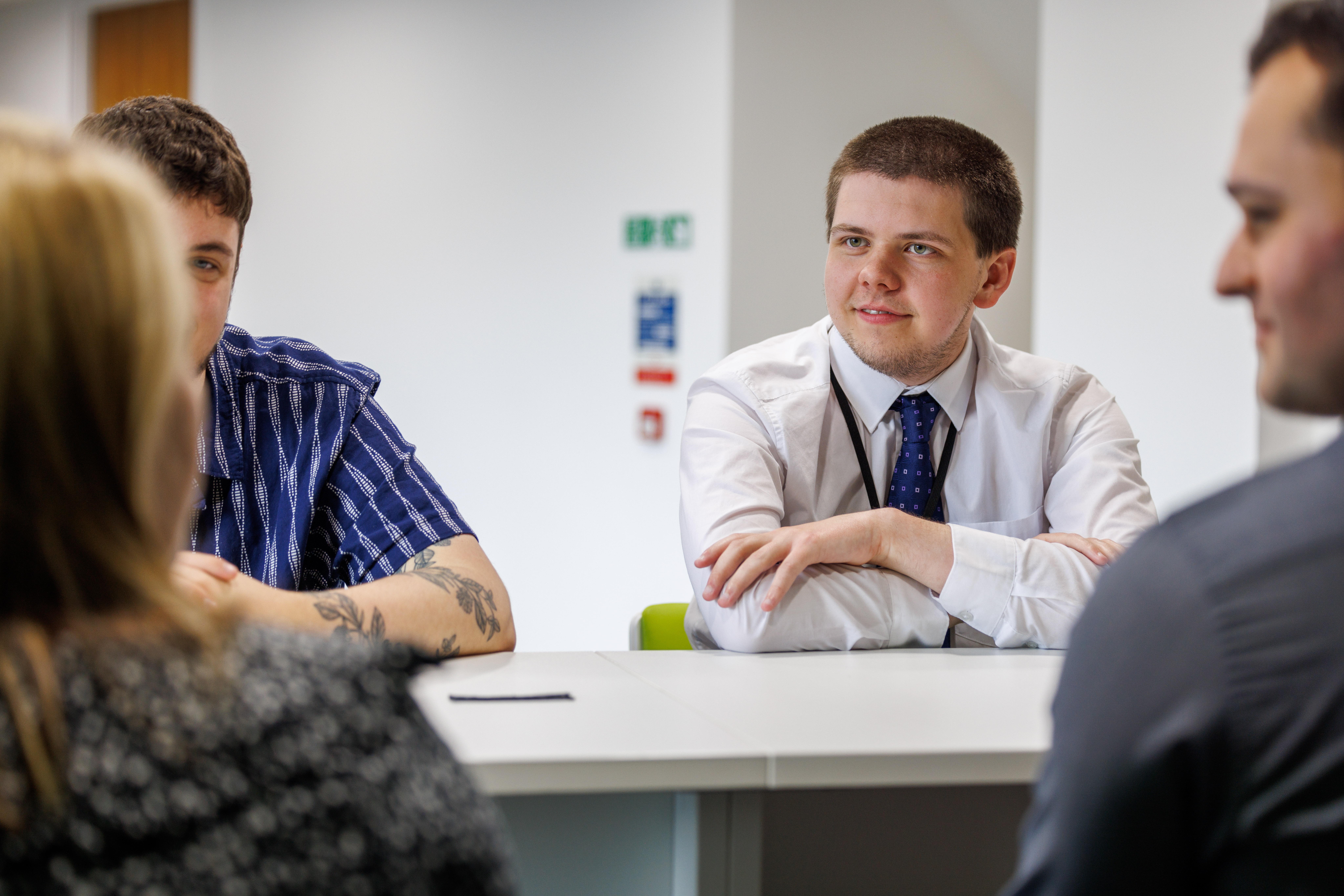 Group of people taking with one person in focus