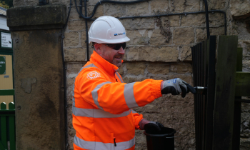 Volunteer painting at Bedale station